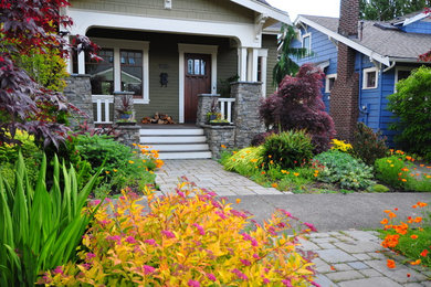 Design ideas for a mid-sized craftsman partial sun front yard brick landscaping in Seattle for summer.