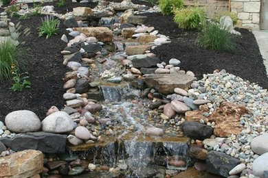 Inspiration for a traditional water fountain landscape in Kansas City.