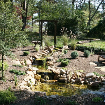 Water feature with mult-tiered stream and pond with walk in edge in Oak Ridge, T