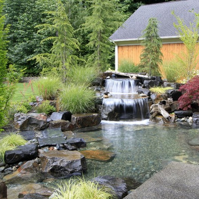 Design ideas for a traditional water fountain landscape in Seattle.