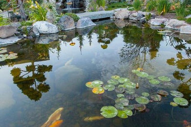 Inspiration for a large transitional courtyard water fountain landscape in Salt Lake City.