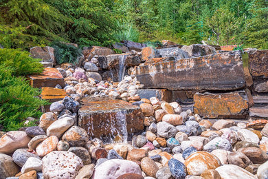 Waterfall Water Feature With River Rock & Kootenay Brown Stone