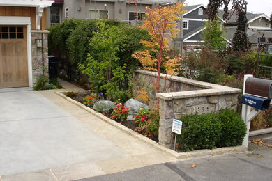 Design ideas for a medium sized traditional front full sun garden in Seattle with concrete paving.