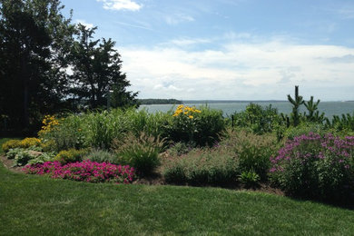 Inspiration for a huge coastal landscaping in New York.