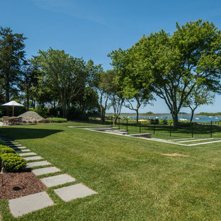 75 Beautiful Beach Style Garden with Concrete Pavers Pictures & Ideas