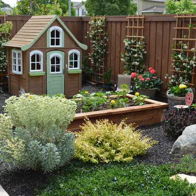 Photo of a small shabby-chic style drought-tolerant and partial sun backyard concrete paver outdoor playset in Sacramento for spring.