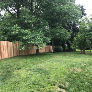 Western Red Cedar Spaced picket fence with French gothic posts and Concave Top