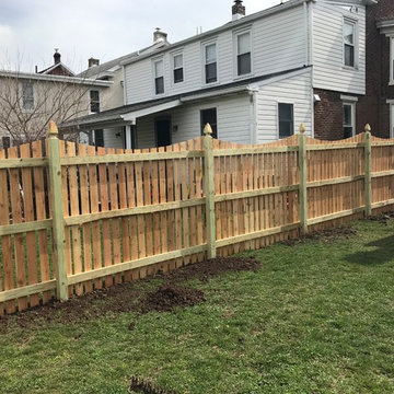 Western Red Cedar Spaced picket fence with French gothic posts and Concave Top