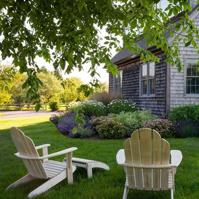 This is an example of a farmhouse landscaping in Boston.