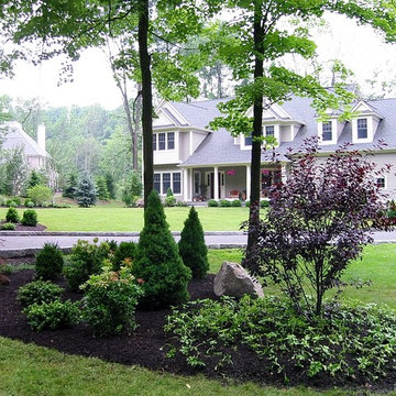 Whole Home Garden Design and Installation; large trees, flowers, shrubs in beds