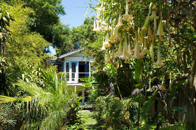 Design ideas for a large tropical full sun backyard garden path in Santa Barbara.