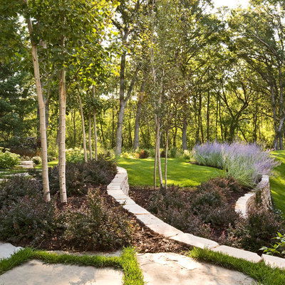 Design ideas for a contemporary retaining wall landscape in Minneapolis.