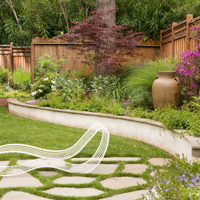 Design ideas for a mid-sized contemporary full sun backyard stone formal garden in San Francisco.