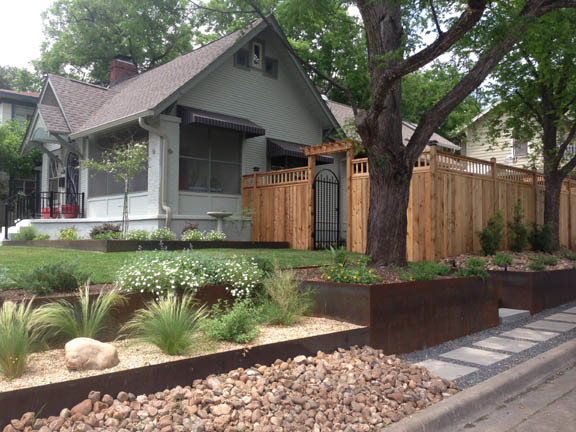 Xeriscape using Core-Ten retaining walls, Basalt pathways w/ stepping stones, Ne
