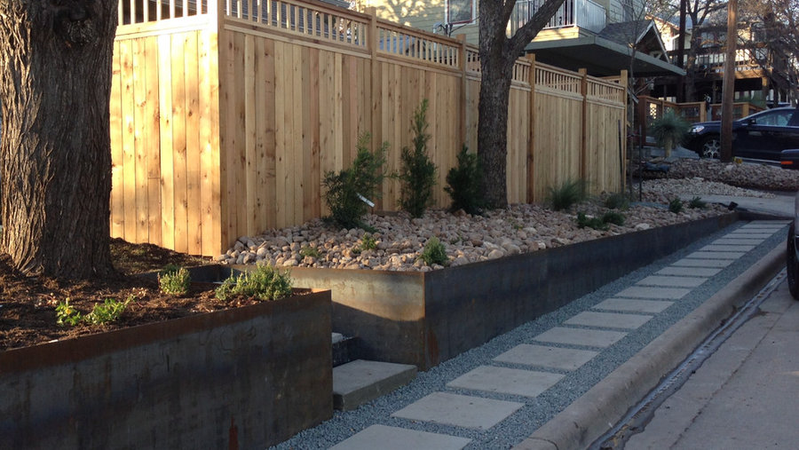 Xeriscape using Core-Ten retaining walls, Basalt pathways w/ stepping stones, Ne
