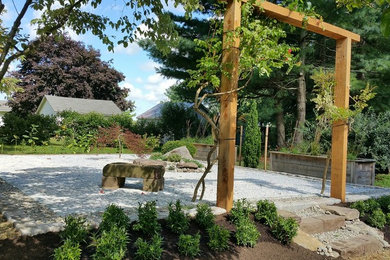 Design ideas for a world-inspired side xeriscape partial sun garden for autumn in Baltimore with a garden path and gravel.