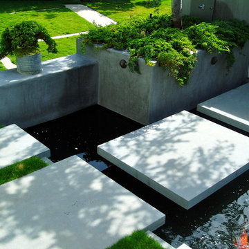 Zen, koi, floating steps, beach plantings, bungalow