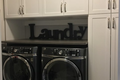 Elegant laundry room photo in Other