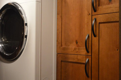 Laundry room - rustic laundry room idea in Boston
