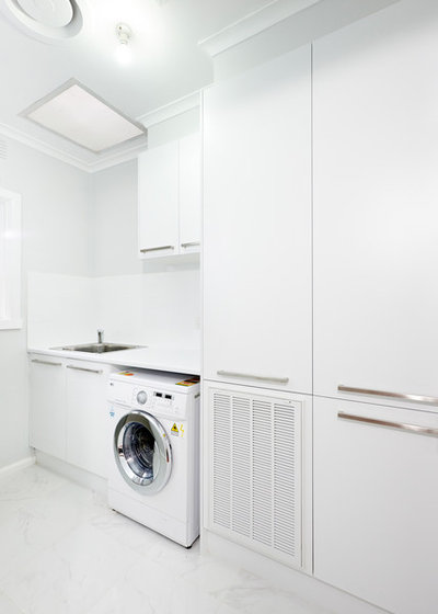 Modern Laundry Room by Damco Kitchens