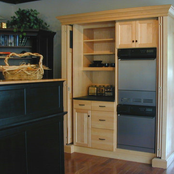 Armoire Hides Laundry and Pantry