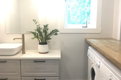 Inspiration for a farmhouse laundry room remodel in Montreal