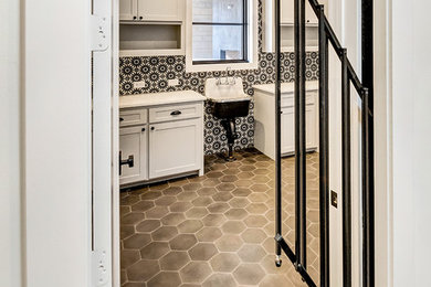 Utility room - cottage utility room idea in Dallas