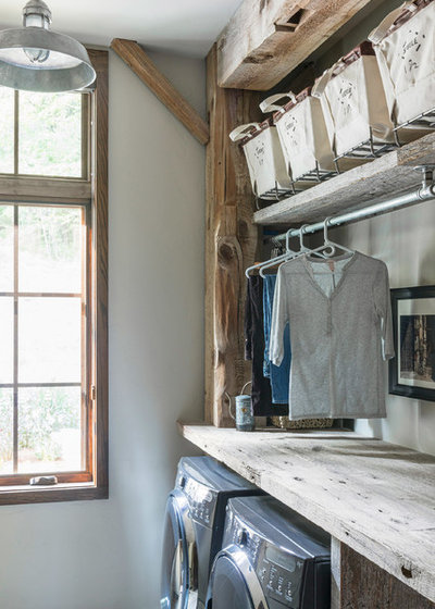 Rustic Laundry Room by Altura Architects