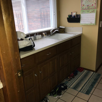 "Before" of "Cheerful laundry room with a view"