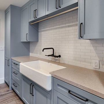 Blue Gray Laundry Room with Farmhouse Sink