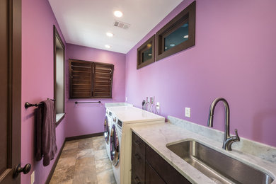 Example of an asian laundry room design in Other