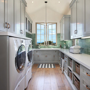 Inspiration for a mediterranean laundry room remodel in Orange County