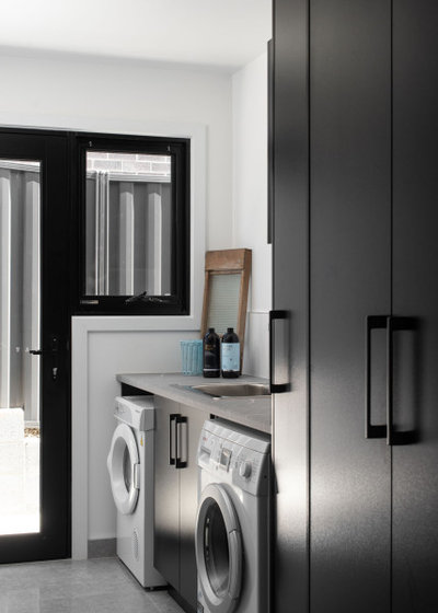Contemporary Laundry Room by Kitchen Centre