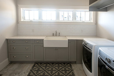 Inspiration for a transitional laundry room remodel in Other