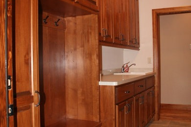 Laundry room - traditional laundry room idea in Milwaukee