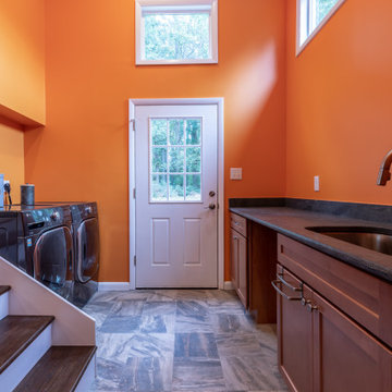 Cheerful Multi Level Rear Addition to Expand Kitchen, Mudroom & Sunroom in Oakt