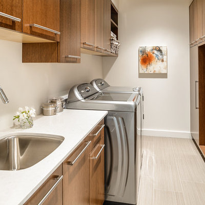 Trendy beige floor laundry room photo in Vancouver with an undermount sink and white countertops