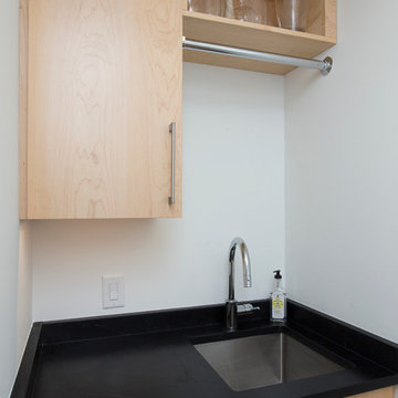 Contemporary Laundry Room with Soapstone Counter