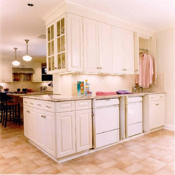 Custom crafted kitchen with hidden laundry now exposed