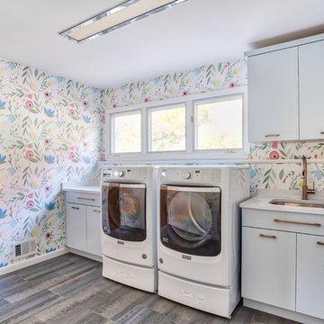 Floral Wallpaper Laundry Room with Blue Vanity