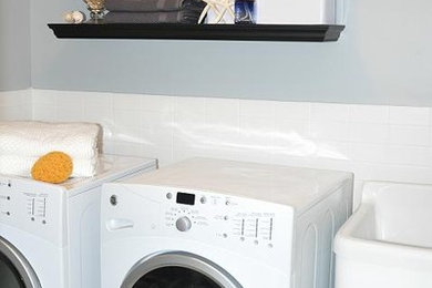 Elegant laundry room photo in Toronto