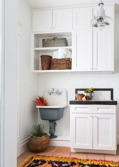 Southwestern Laundry Room by NEST Design Group