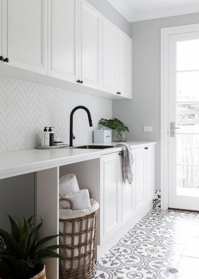 Traditional Laundry Room by Studio Black Interiors