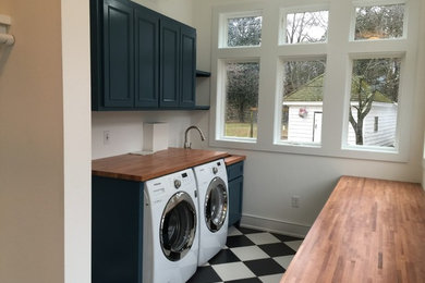 Example of an arts and crafts laundry room design in Baltimore