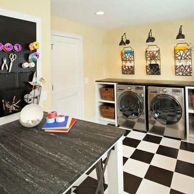 Mid-sized transitional linoleum floor and multicolored floor utility room photo in Minneapolis with white cabinets, shaker cabinets, granite countertops, yellow walls, a side-by-side washer/dryer and black countertops