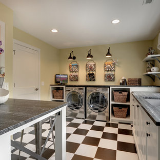 Elegant multicolored floor laundry room photo in Minneapolis with white cabinets, a side-by-side washer/dryer and gray countertops