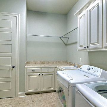 Large Laundry Room with custom cabinets