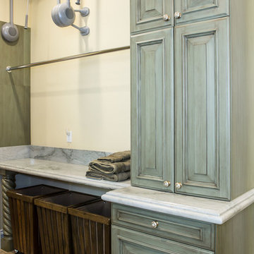 Large Laundry Room with Green Cabinets