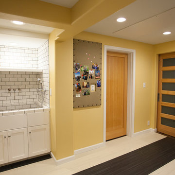 Laundry and mud room with custom dog wash