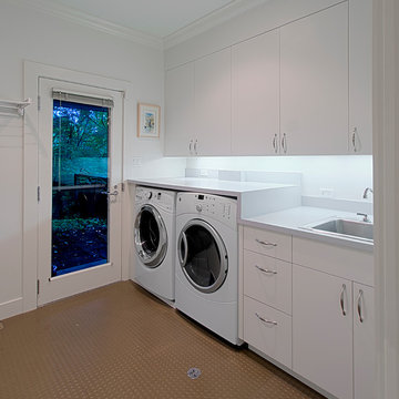 Laundry & Mudrooms w Custom white Cabinetry